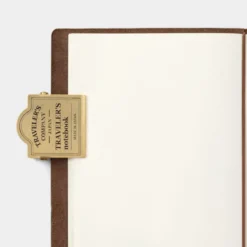 Traveler's Company | Clip Brass Traveler Logo